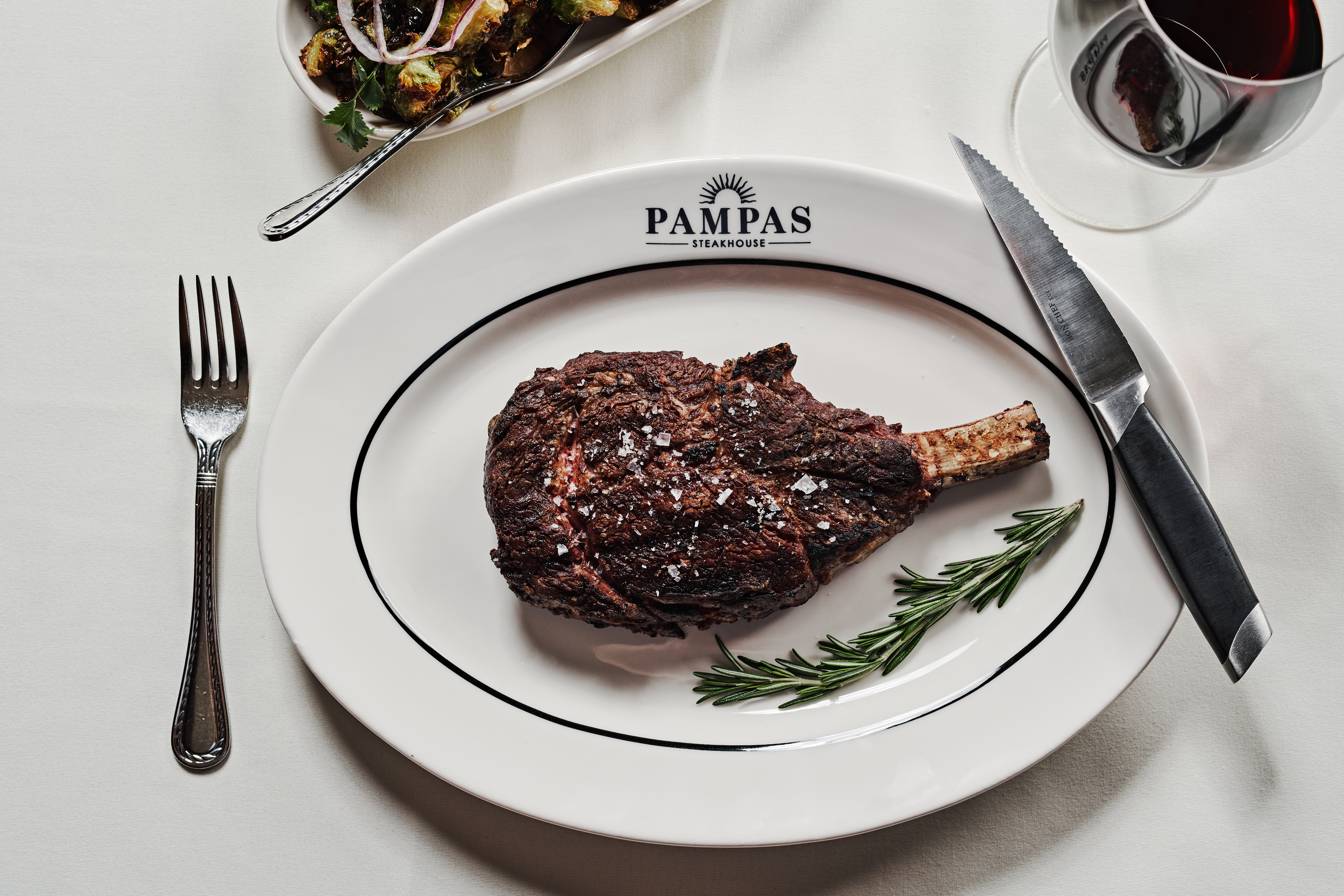 a piece of cake on a plate with a fork and knife