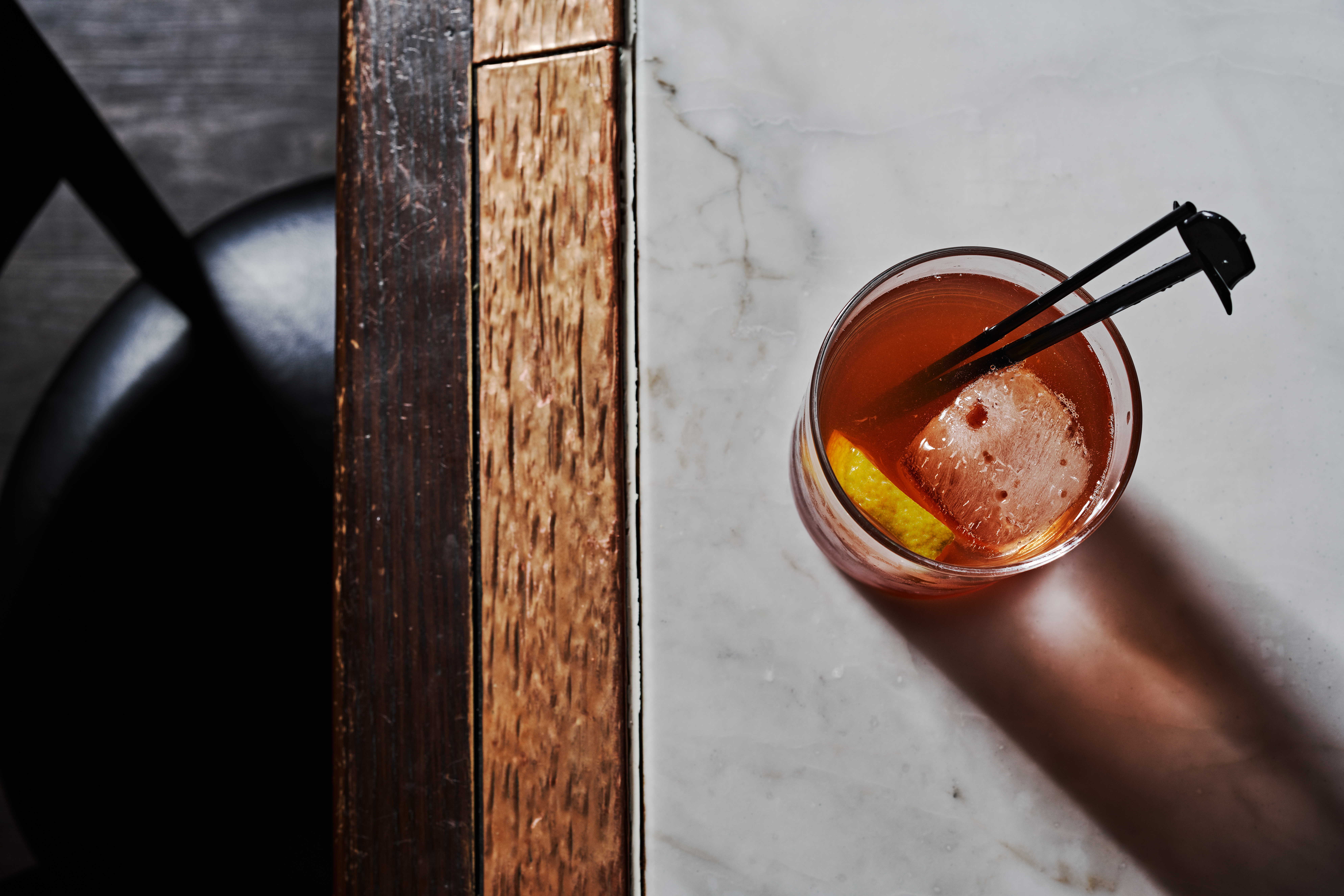 a knife sitting on top of a wooden table