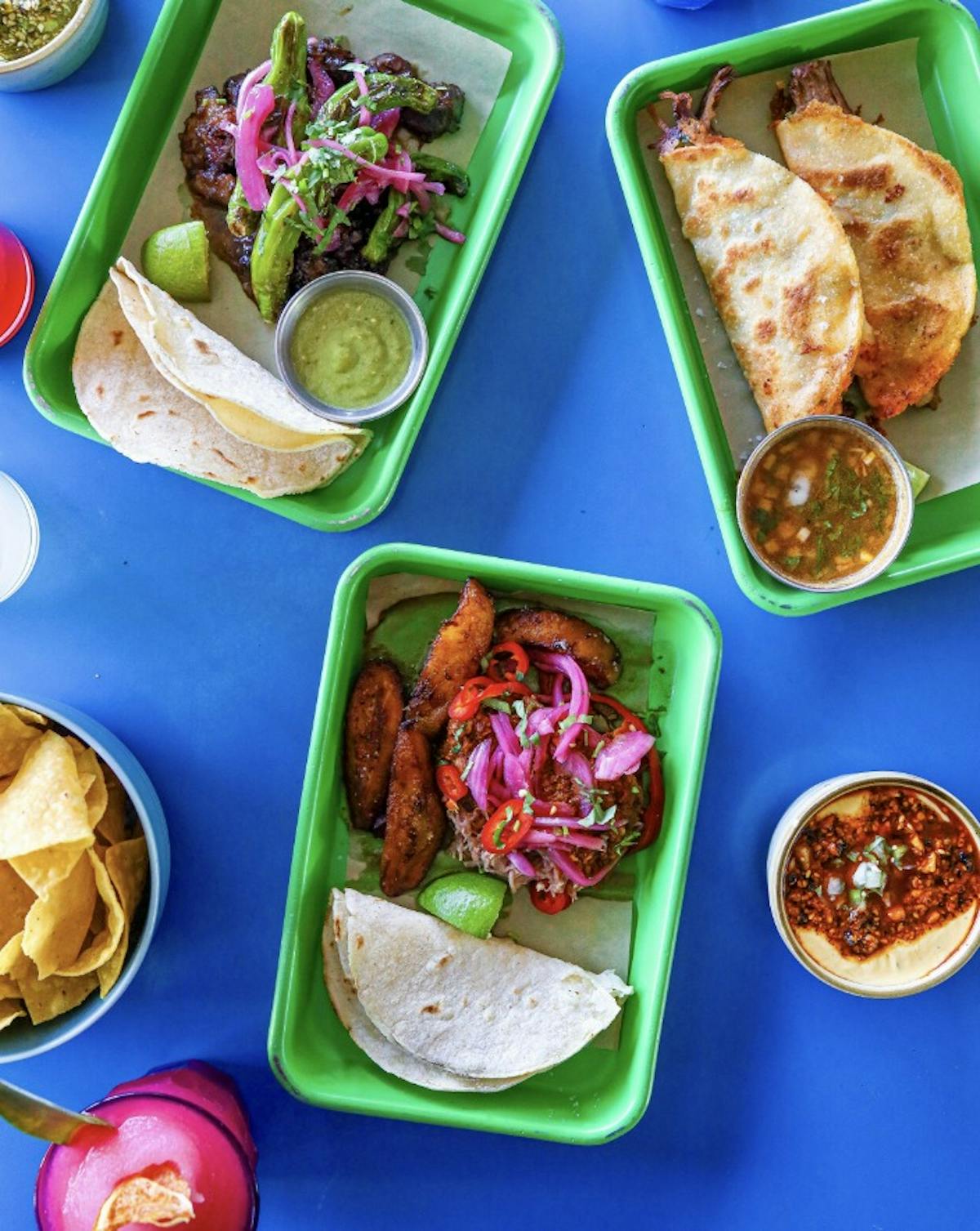 a plastic container filled with different types of food on a tray