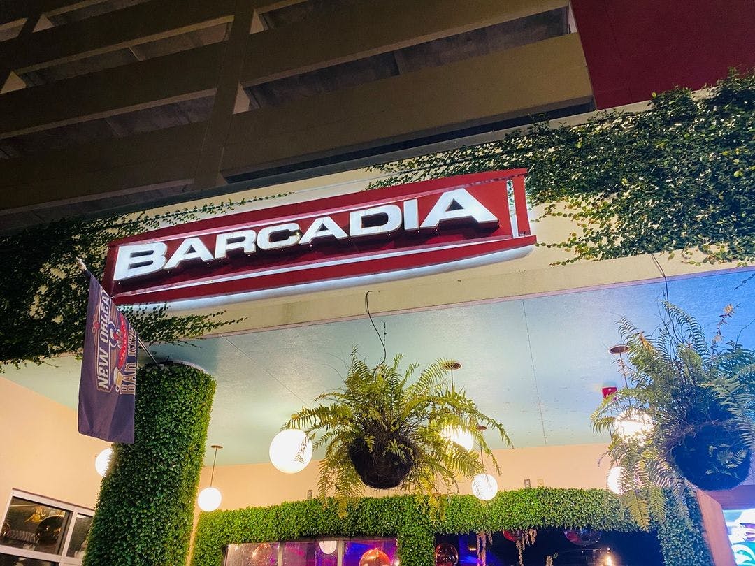 a sign in front of a building
