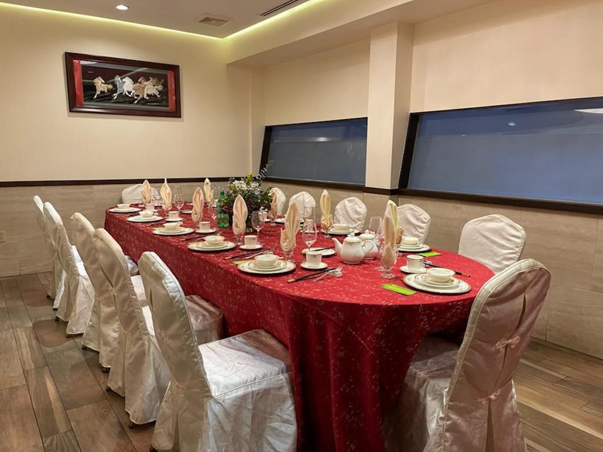 a dining room filled with furniture and a table