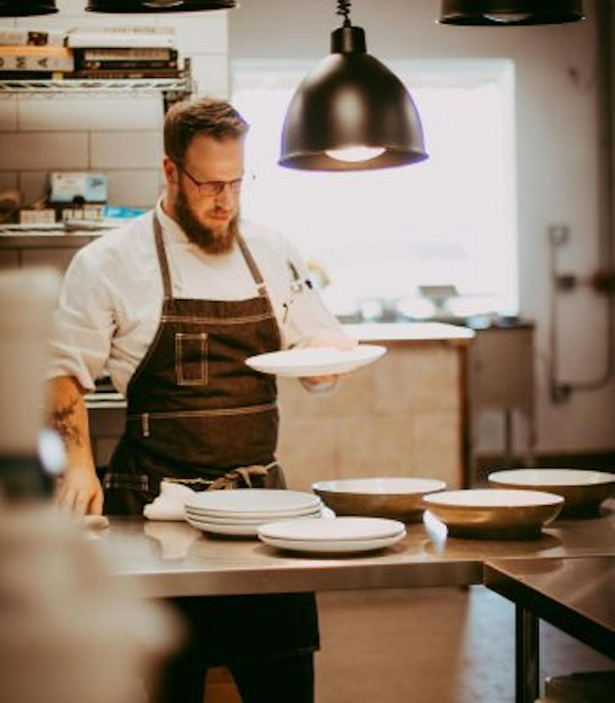 a person preparing food in a kitchen