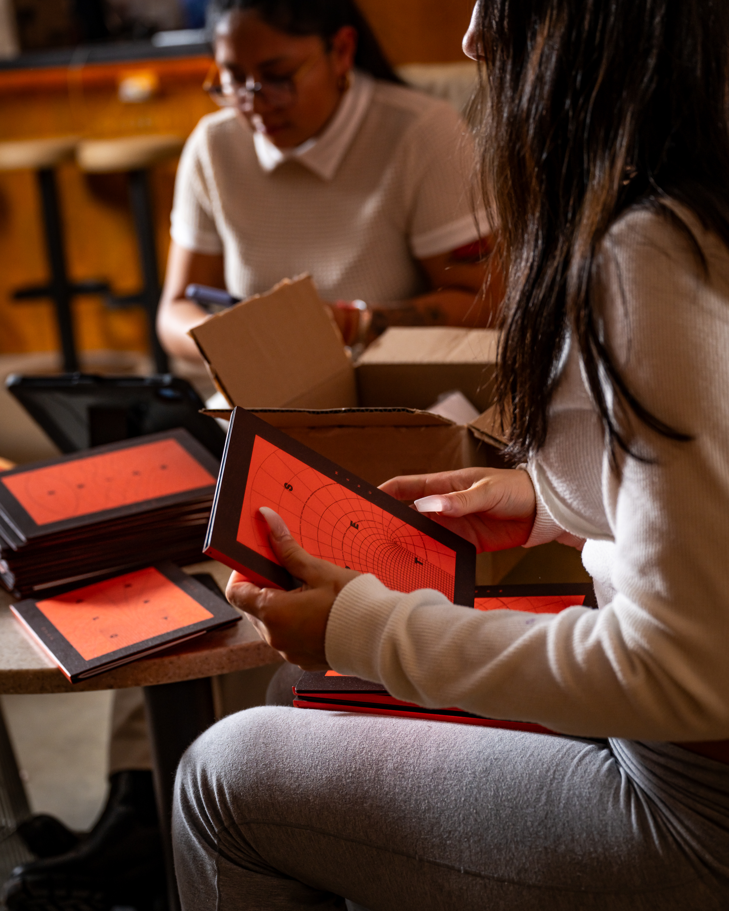 a person holding menus