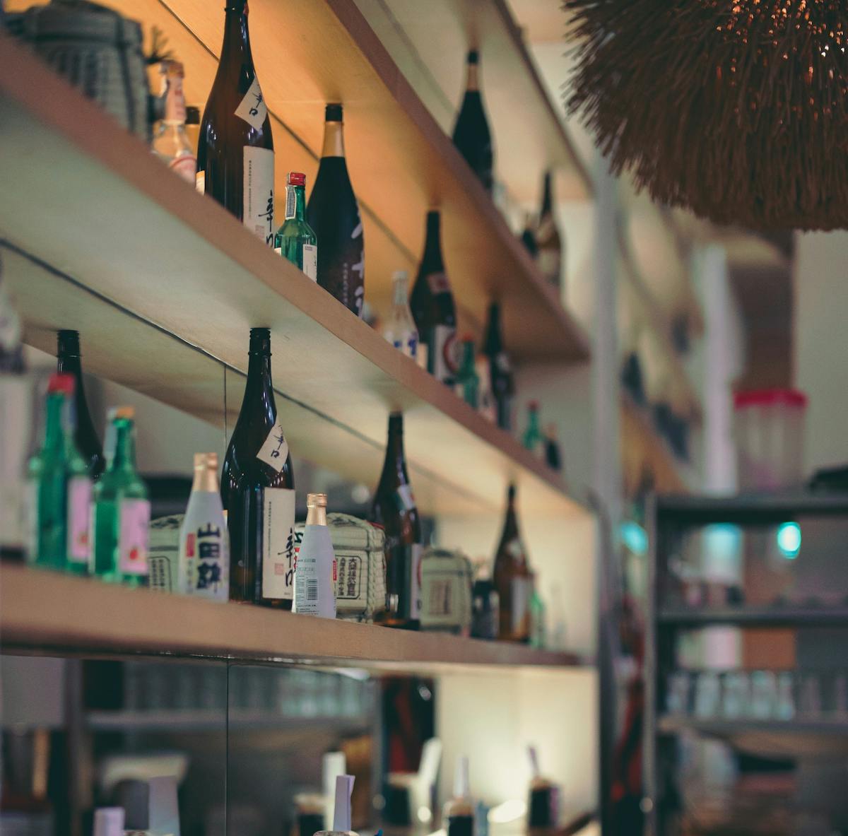 a bottle of wine on a shelf