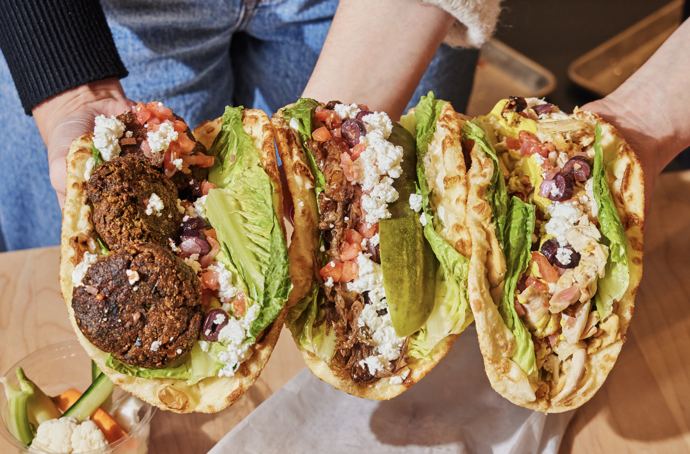 a bunch of different types of food on a table
