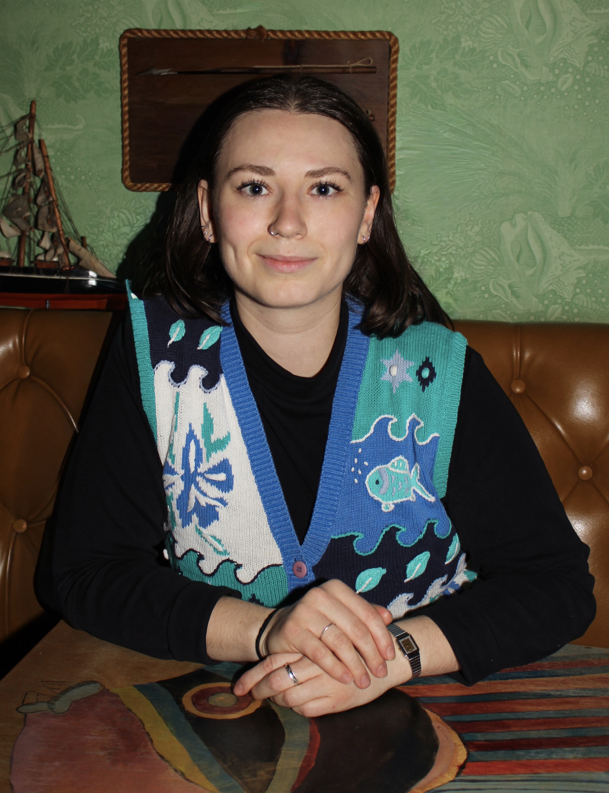 a woman sitting at a table