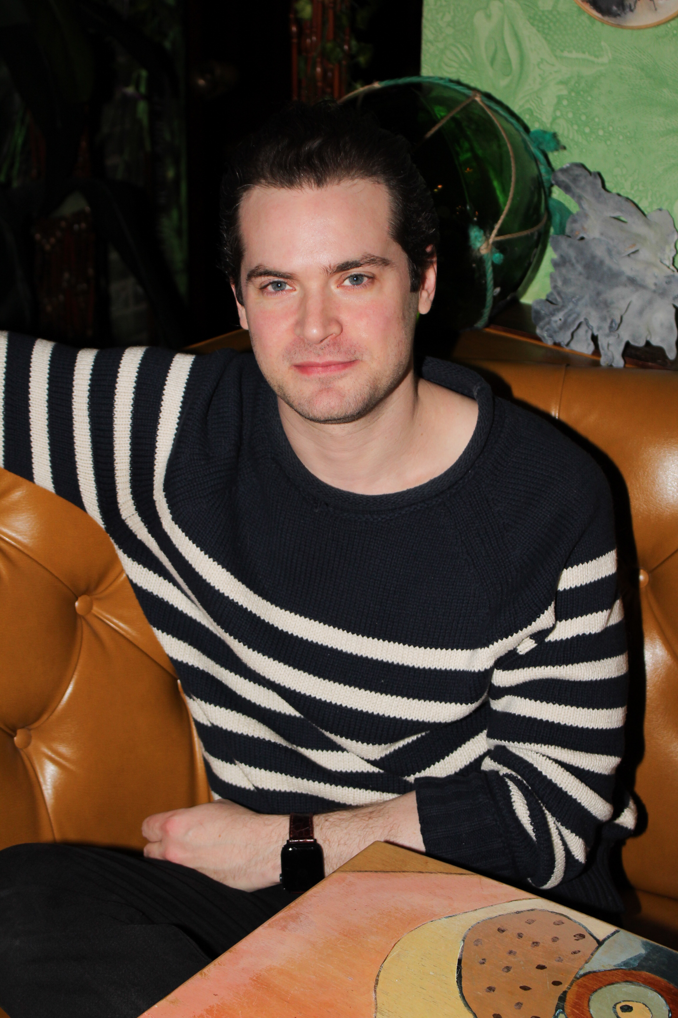 a person sitting on a couch