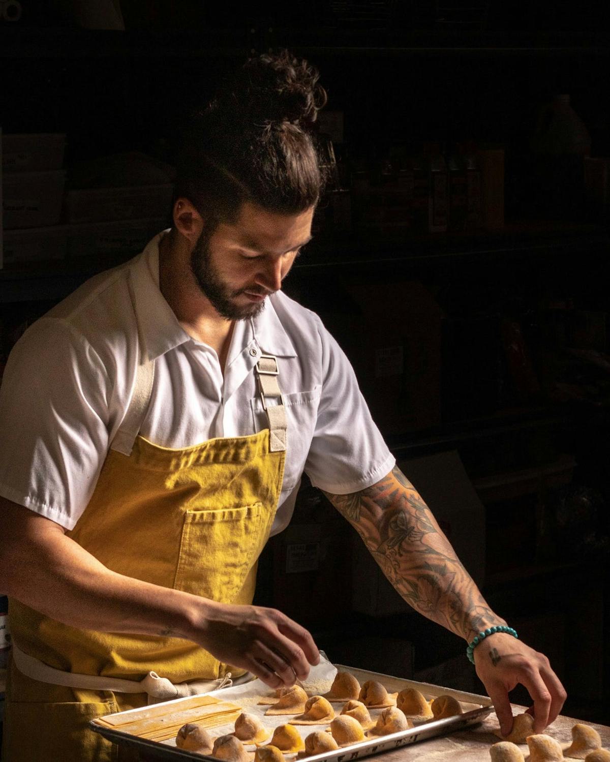a man preparing food inside of it
