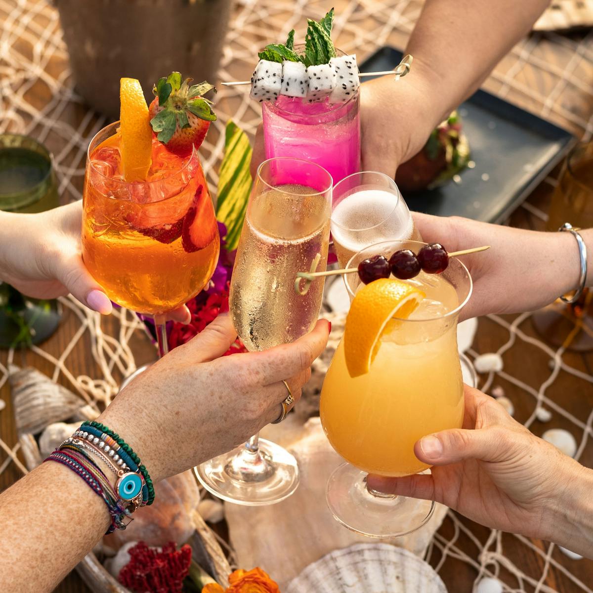 a person holding a wine glass