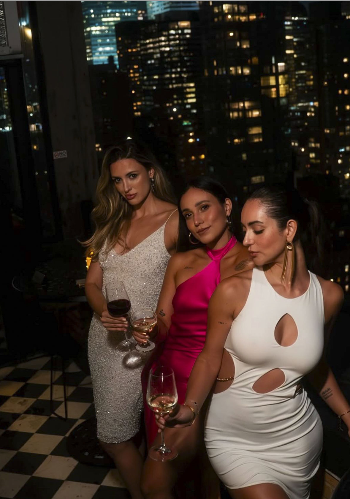 Guests enjoying Latin Night at Ophelia Lounge rooftop