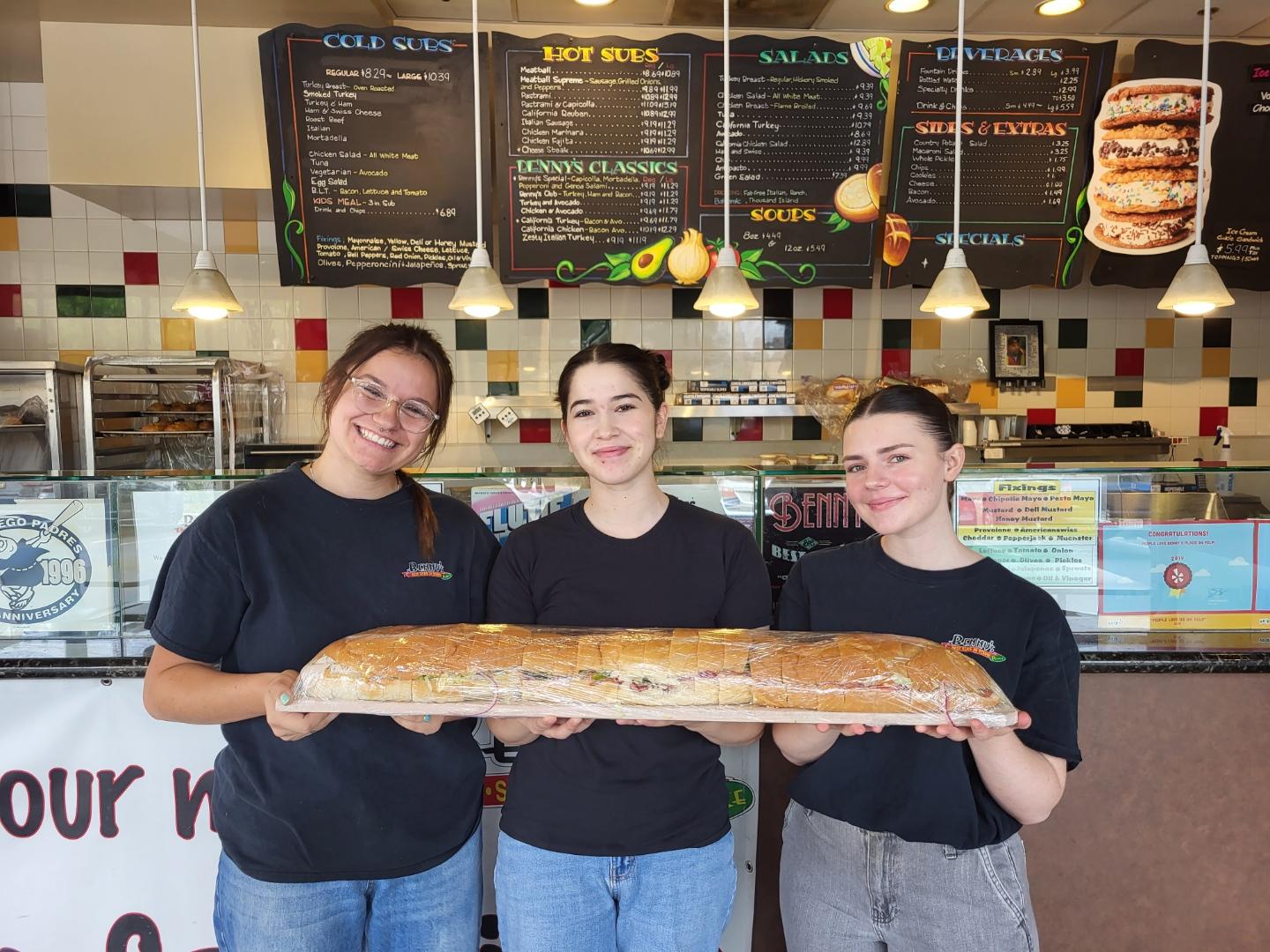 Nil Karaibrahimgil holding a hot dog