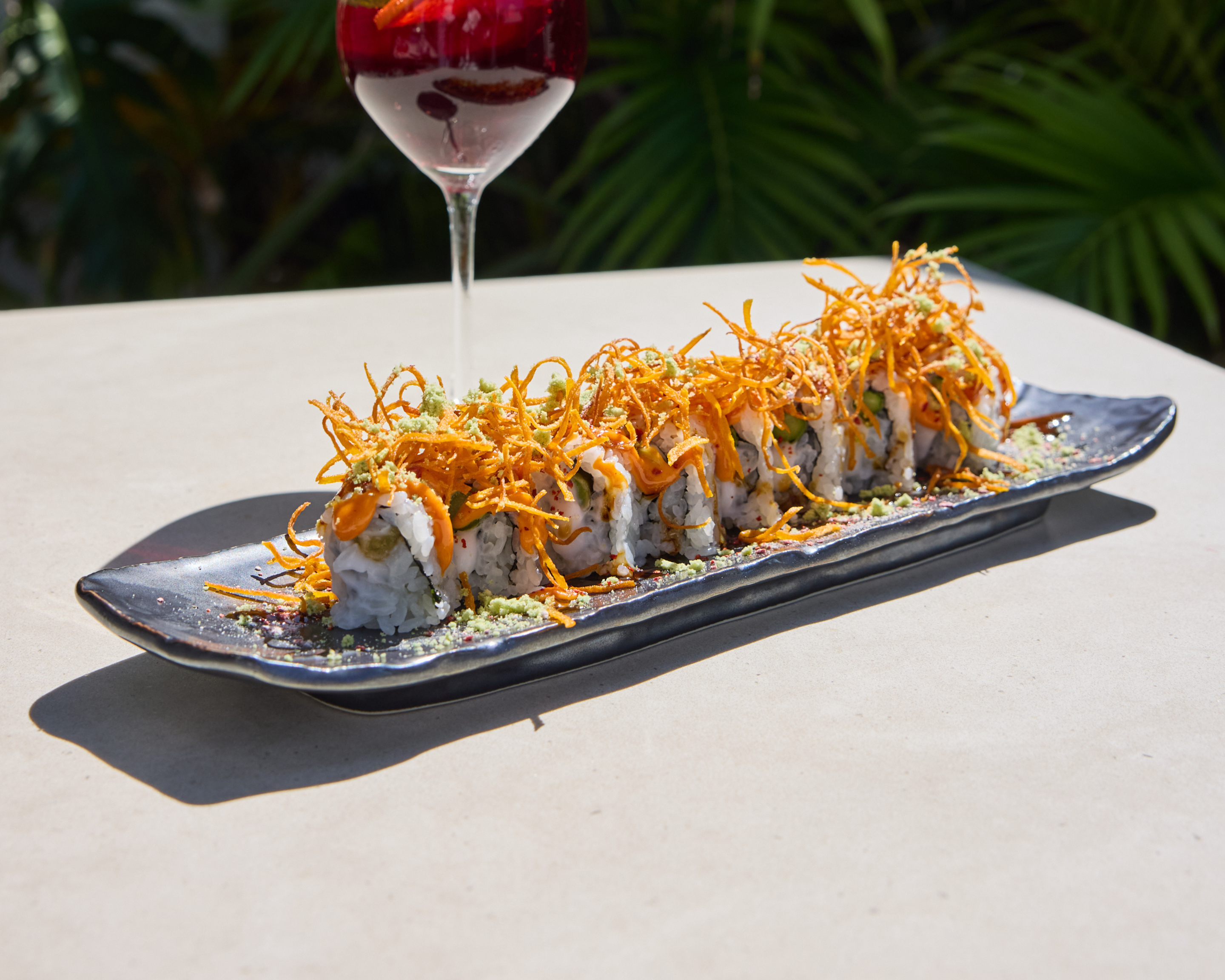 a glass of wine on a table