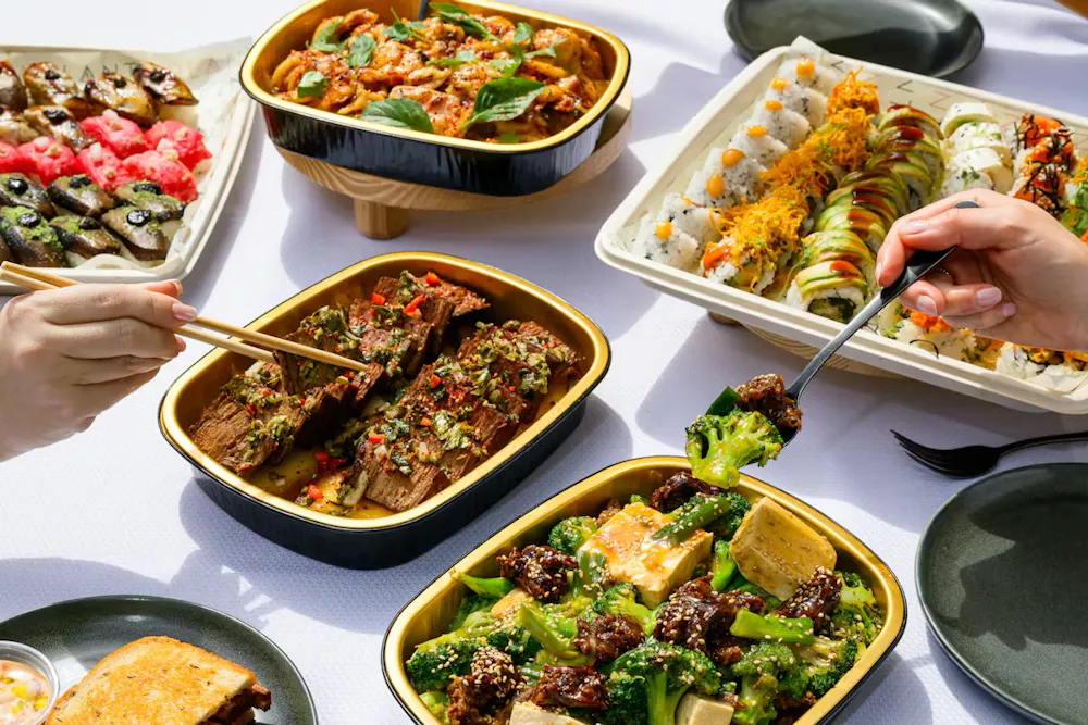 a group of trays of food