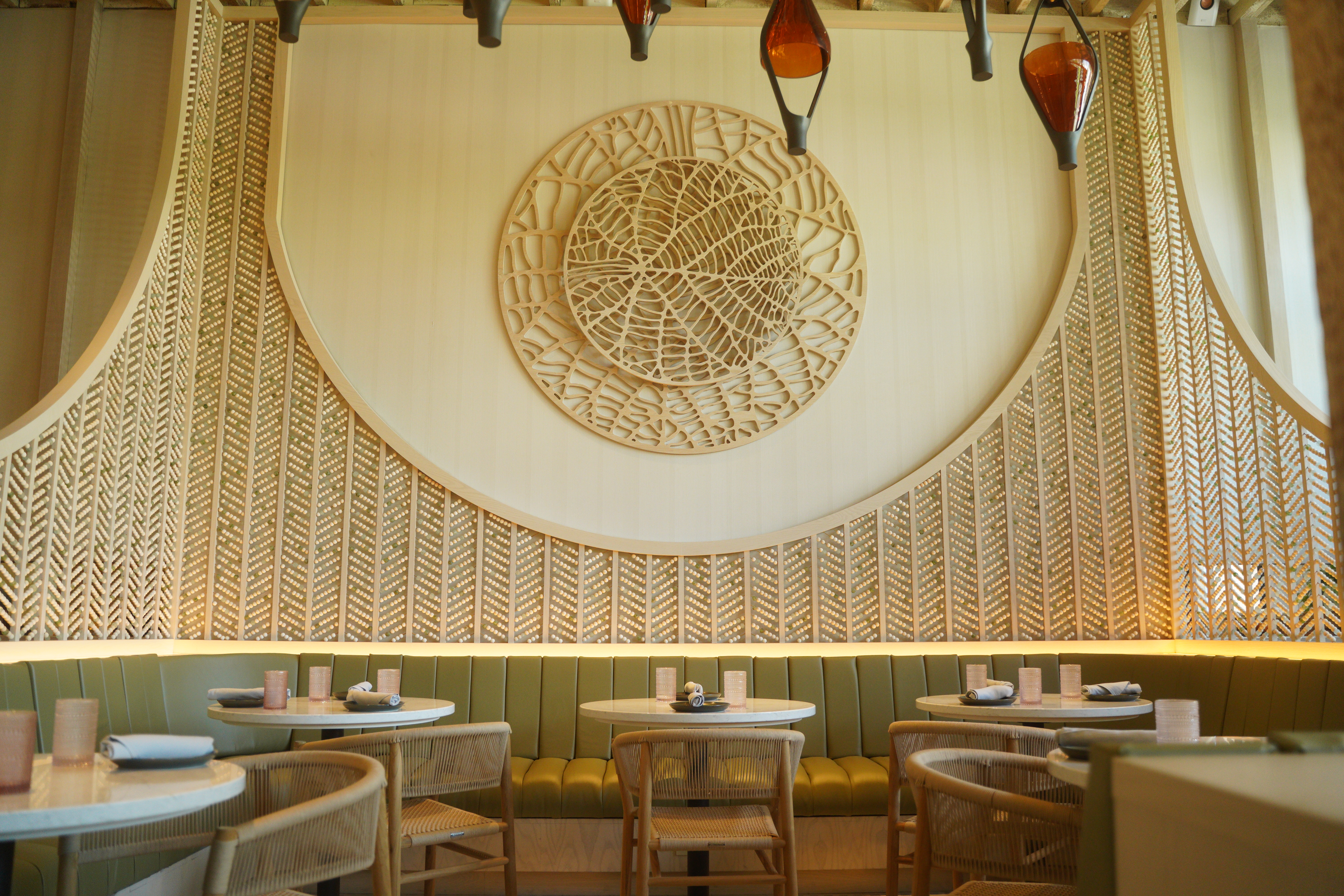 a chair sitting in front of a mirror