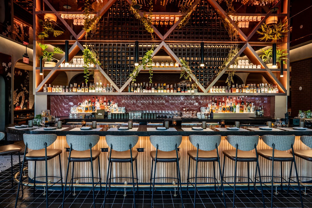 a dining table in front of a building