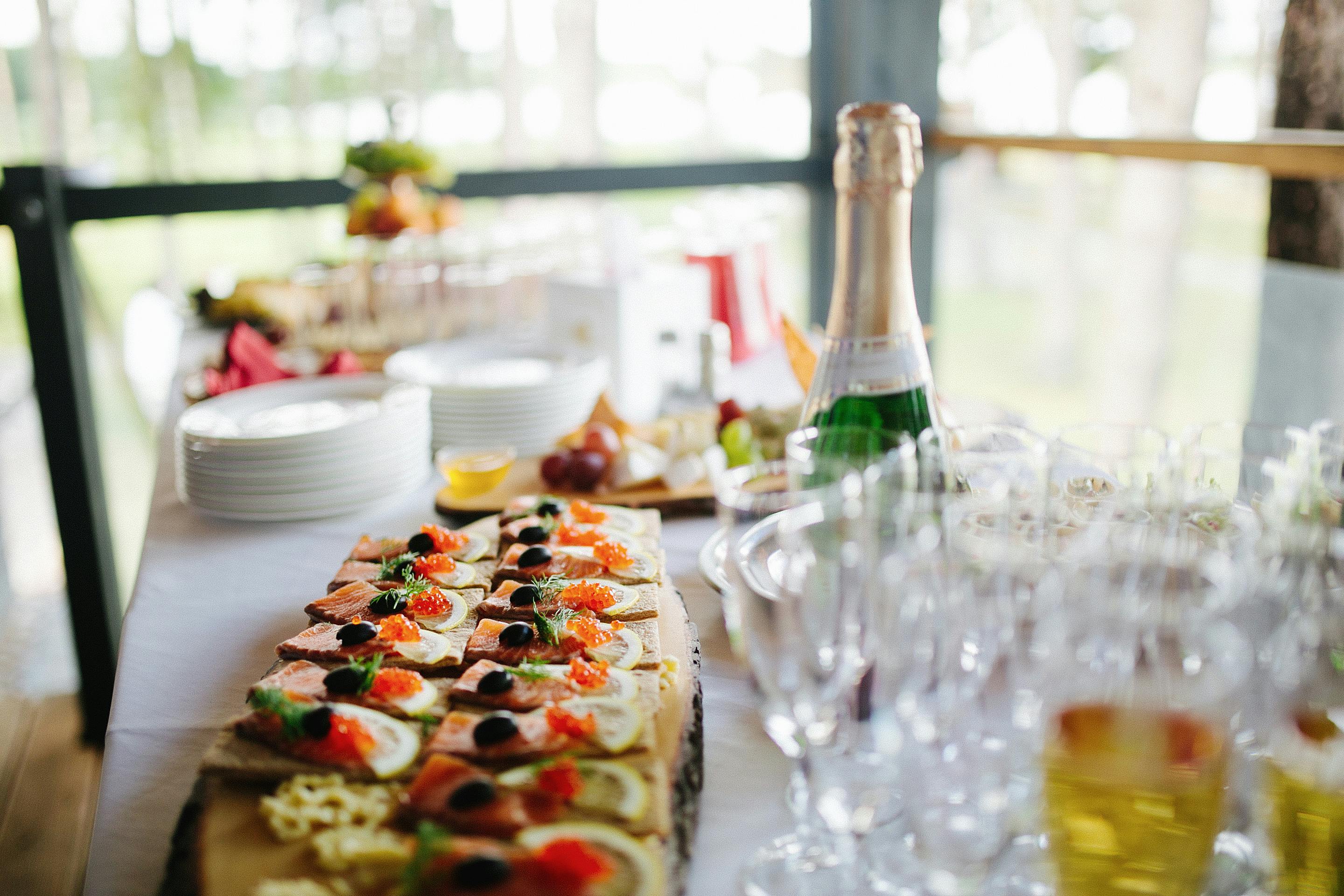a table with food and glasses