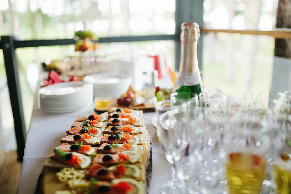 a table with food and glasses
