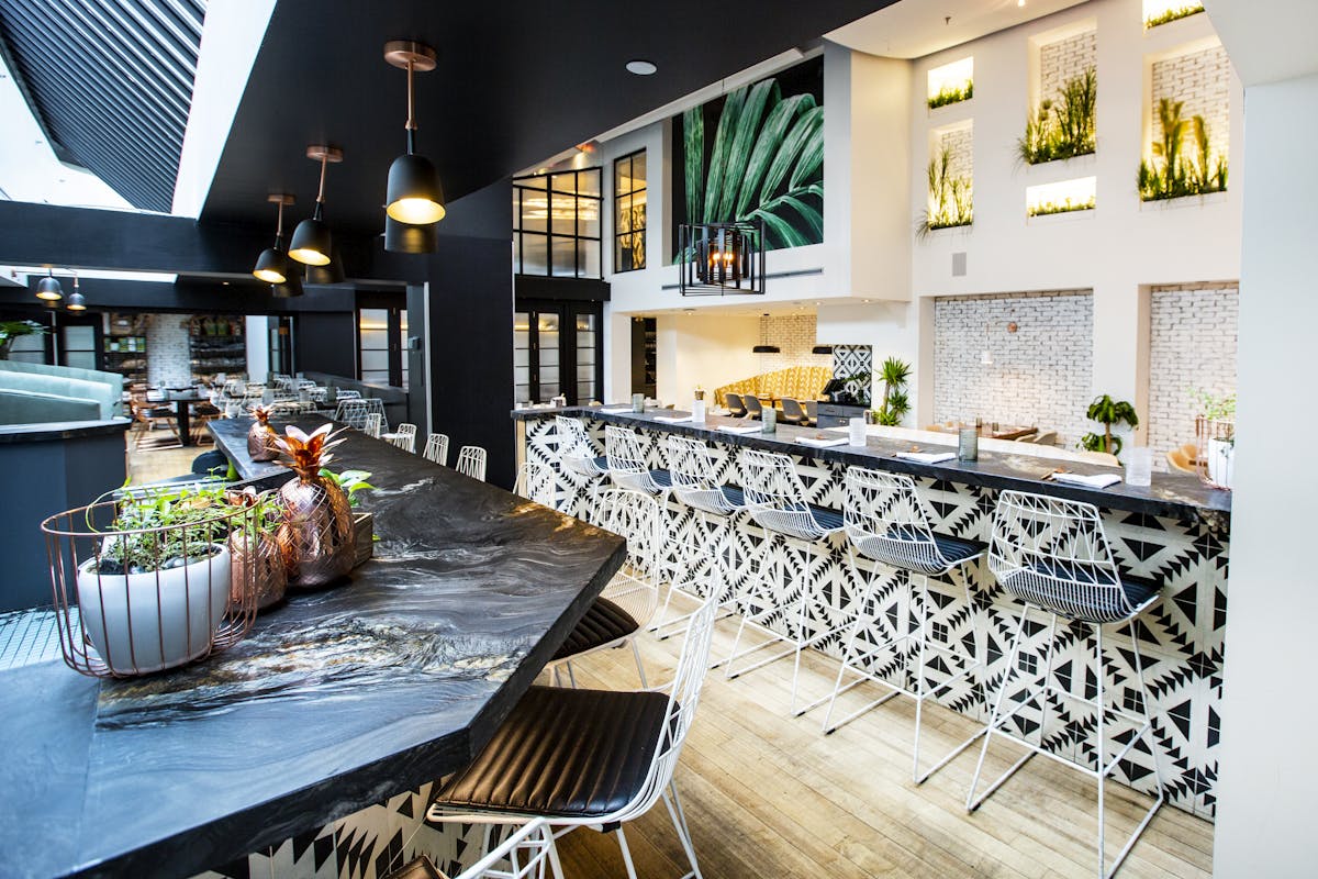 a dining room table in front of a building
