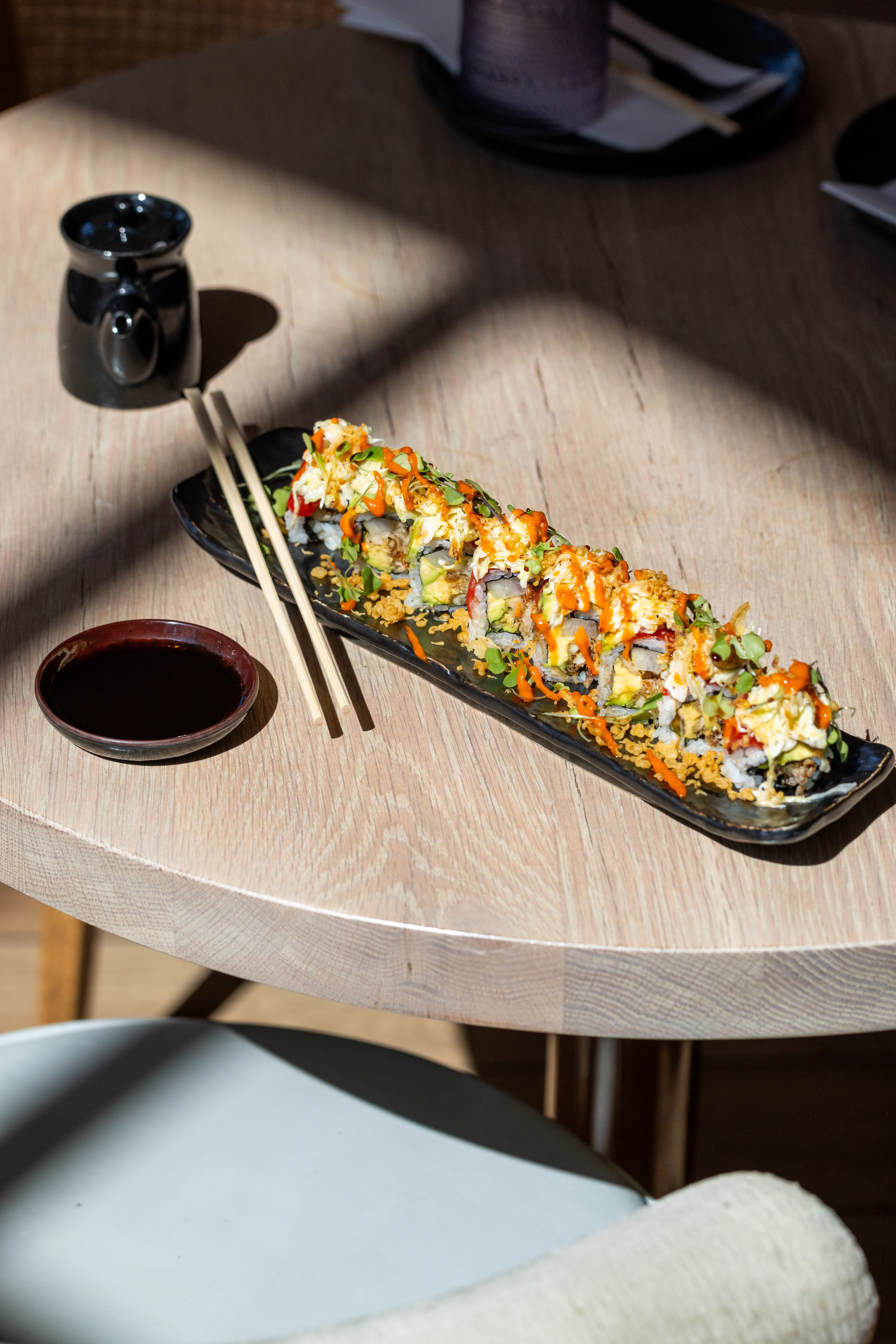 a plate of sushi on a table