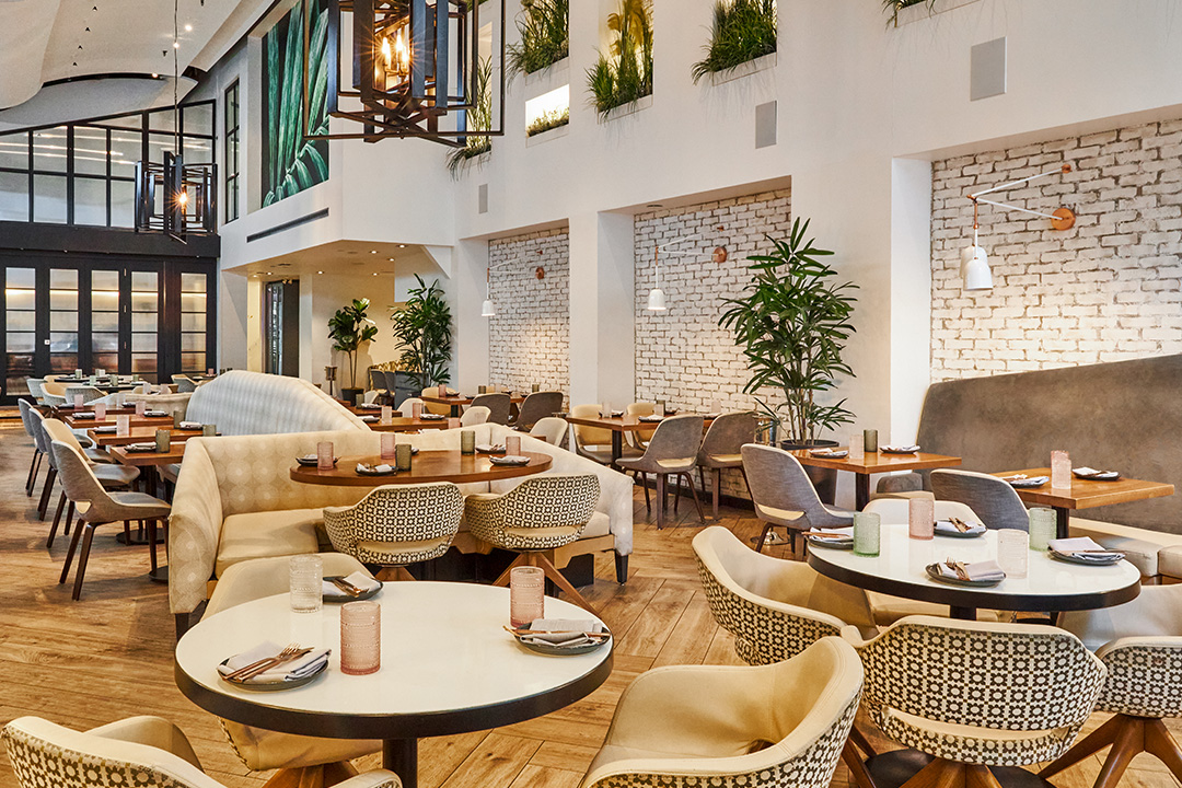 a room with tables and chairs