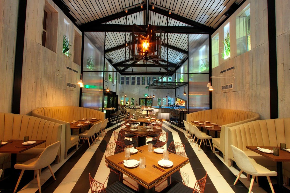 a dining room table in front of a building