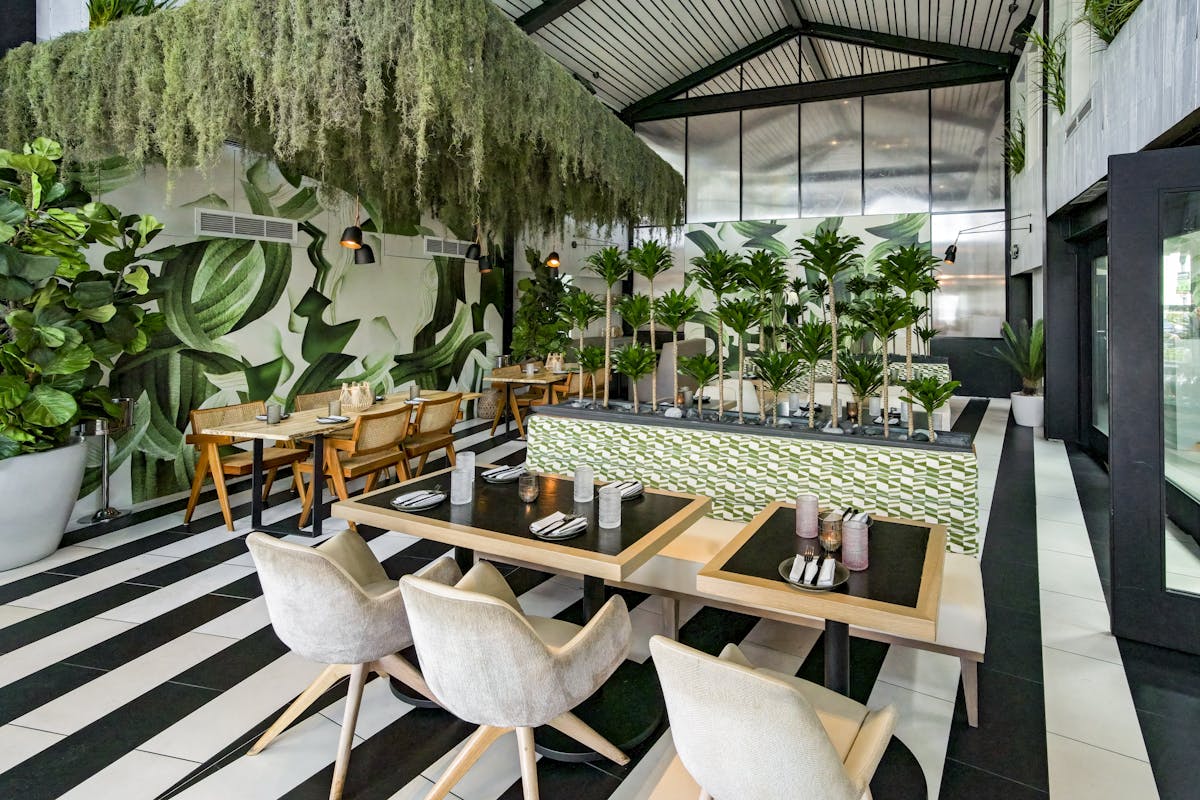 a dining room table in front of a building