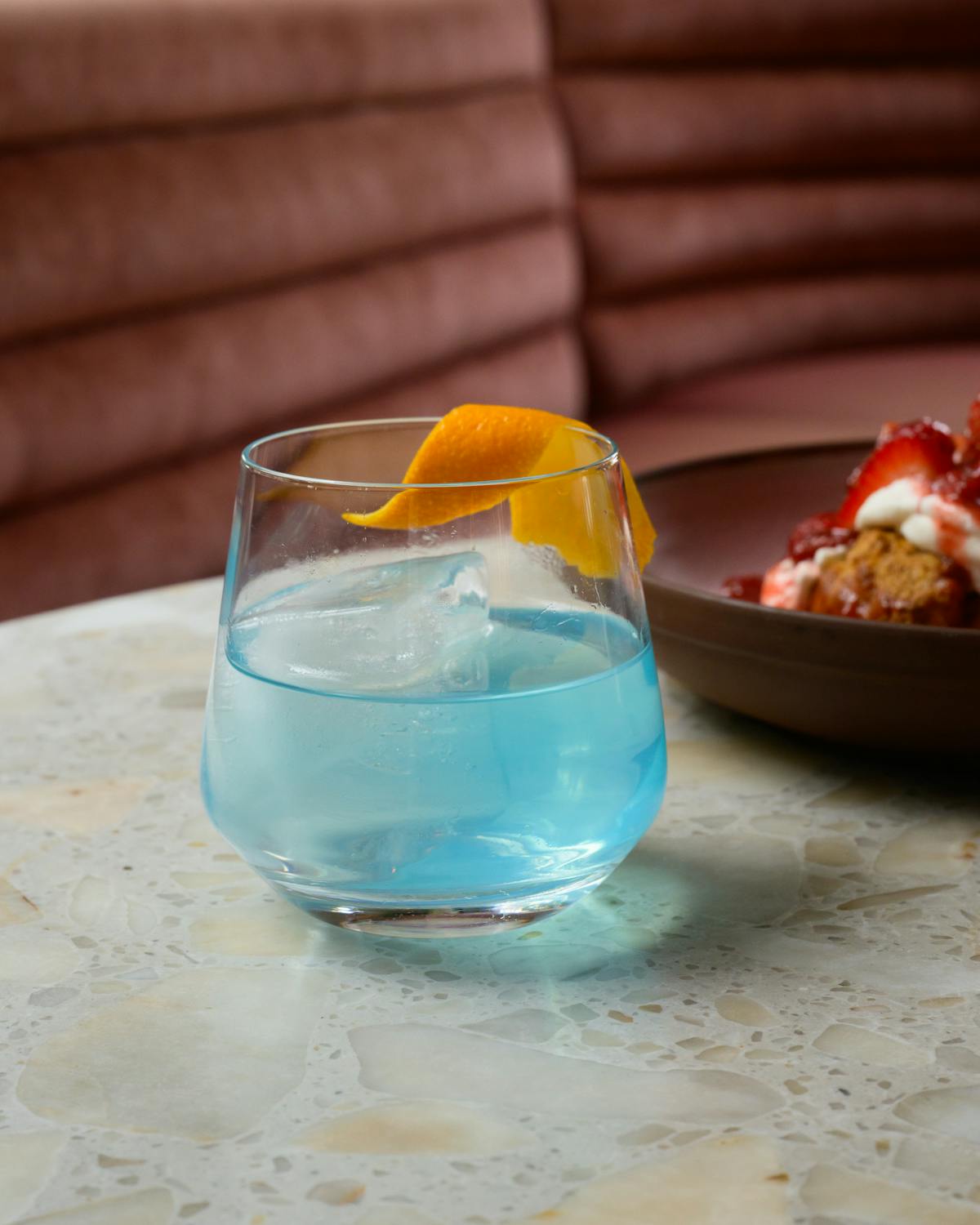 a cup of water on a table