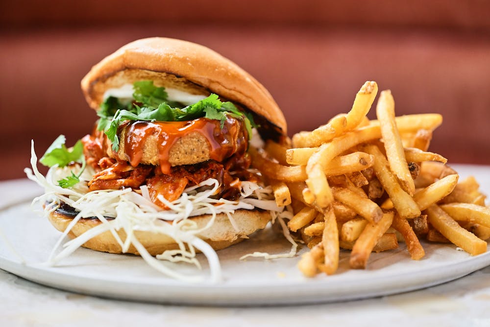PLANTA burger and fries on a plate