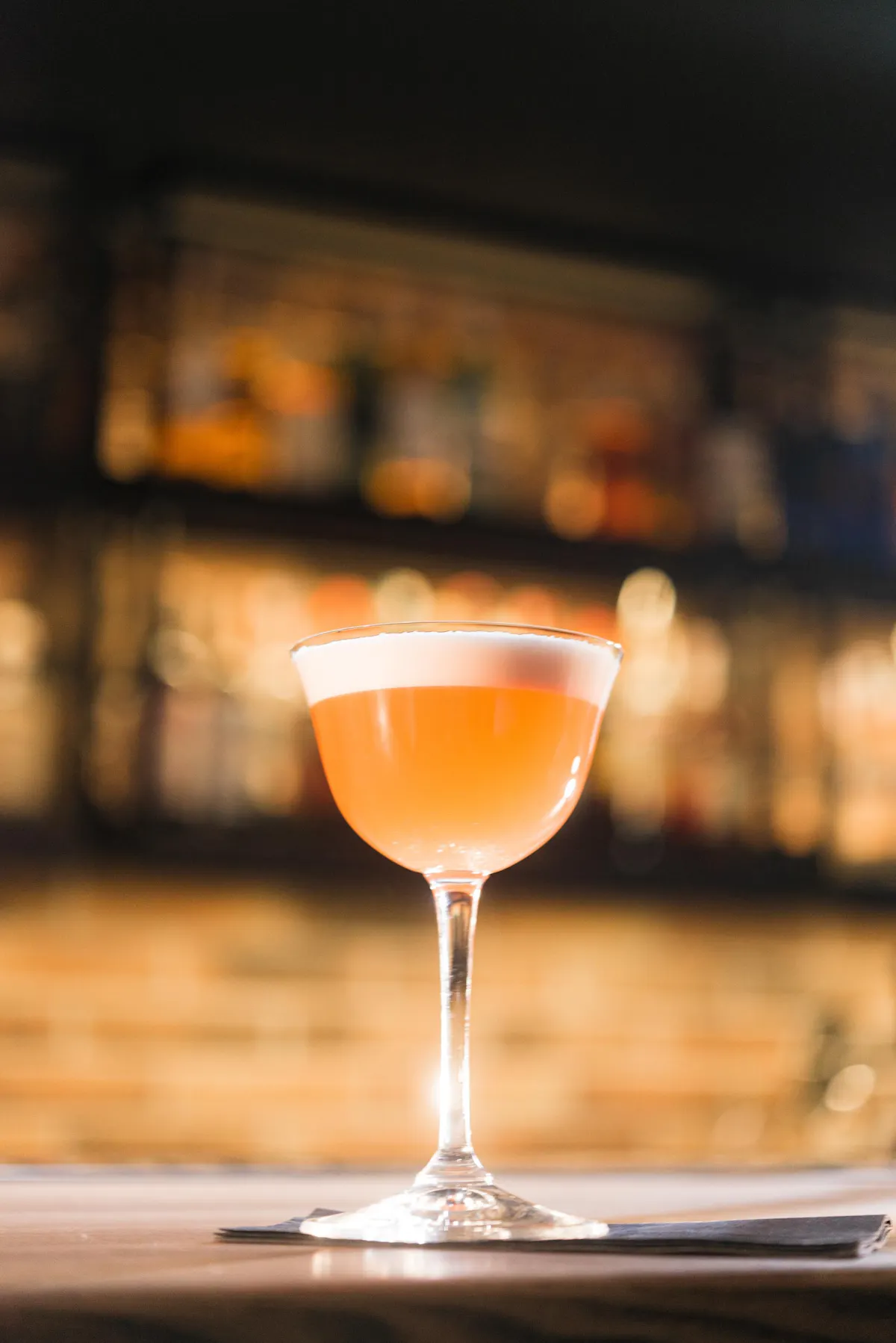a close up of a wine glass