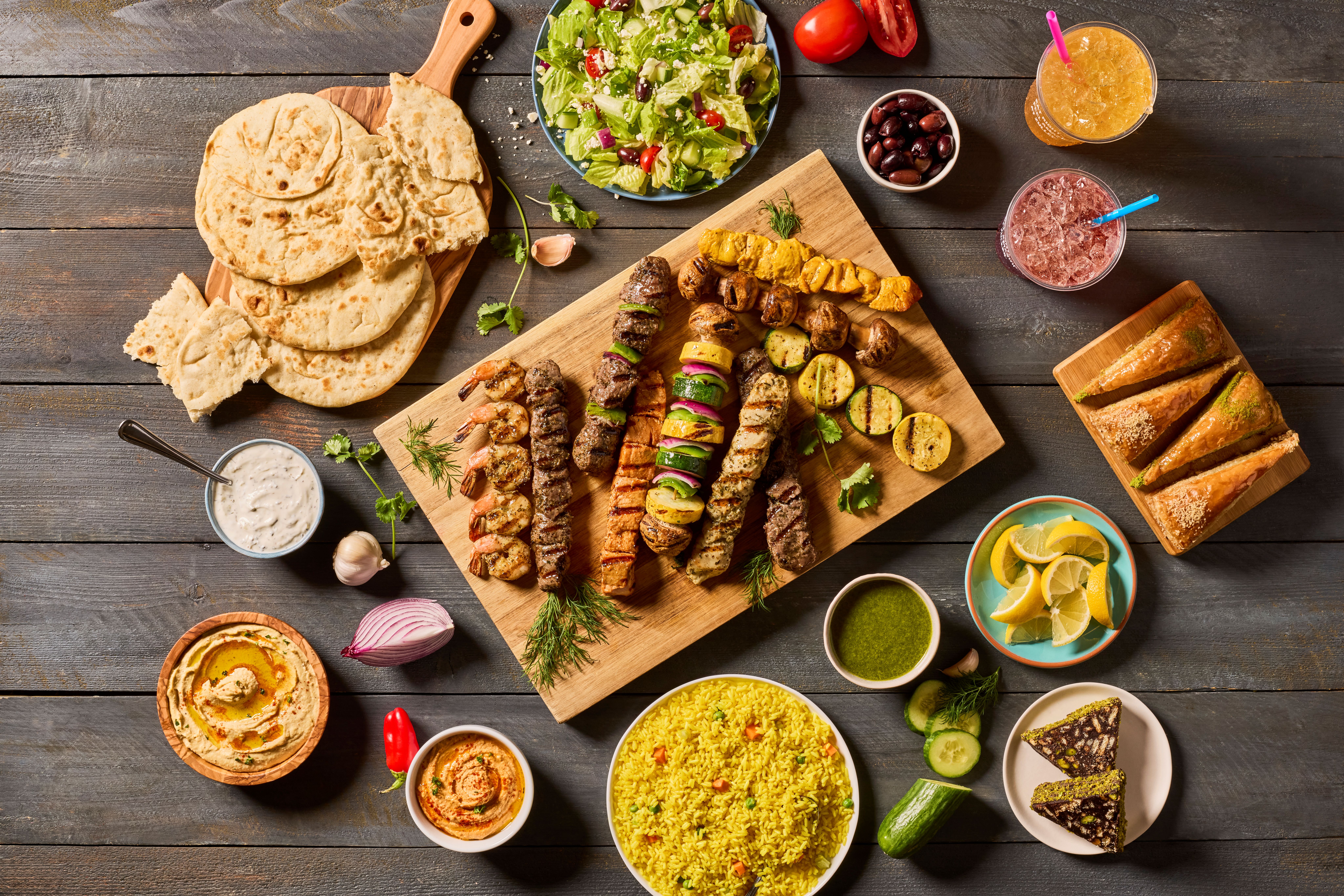 a bunch of different types of food on a table