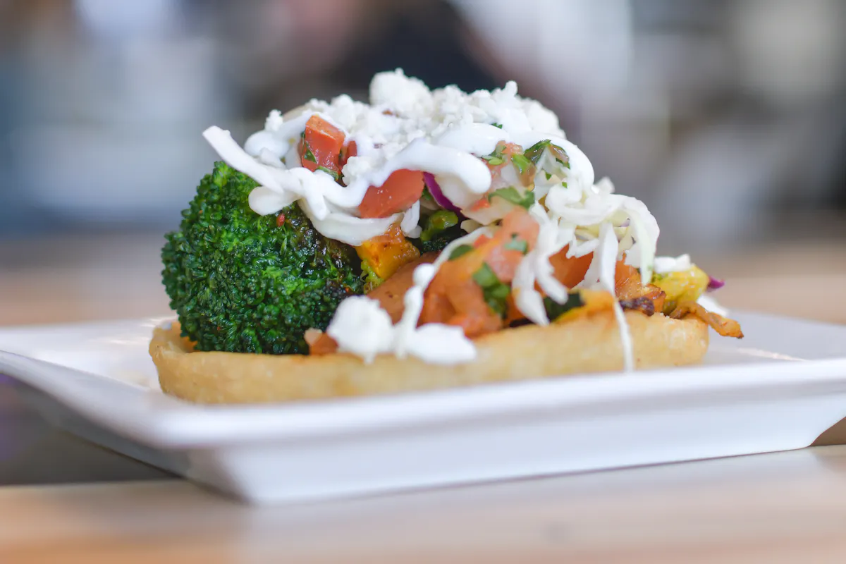 a close up of a plate of food with broccoli