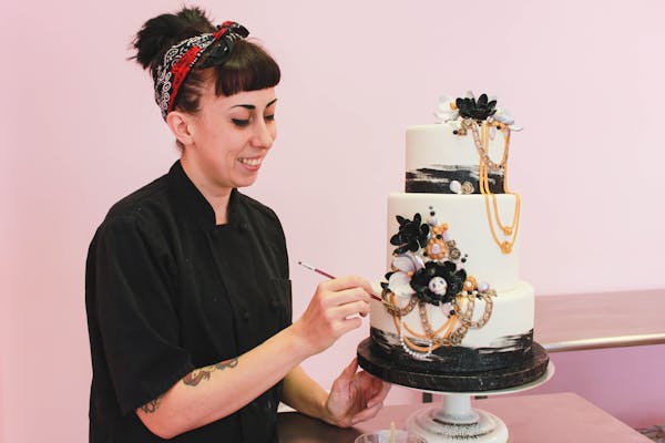 Bre decorating a cake