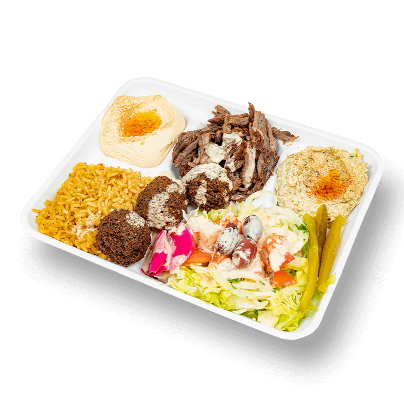 Mamoun's Combo Plate with falafel, hummus and baba ganouj over salad, vegan and gluten-free without the pita