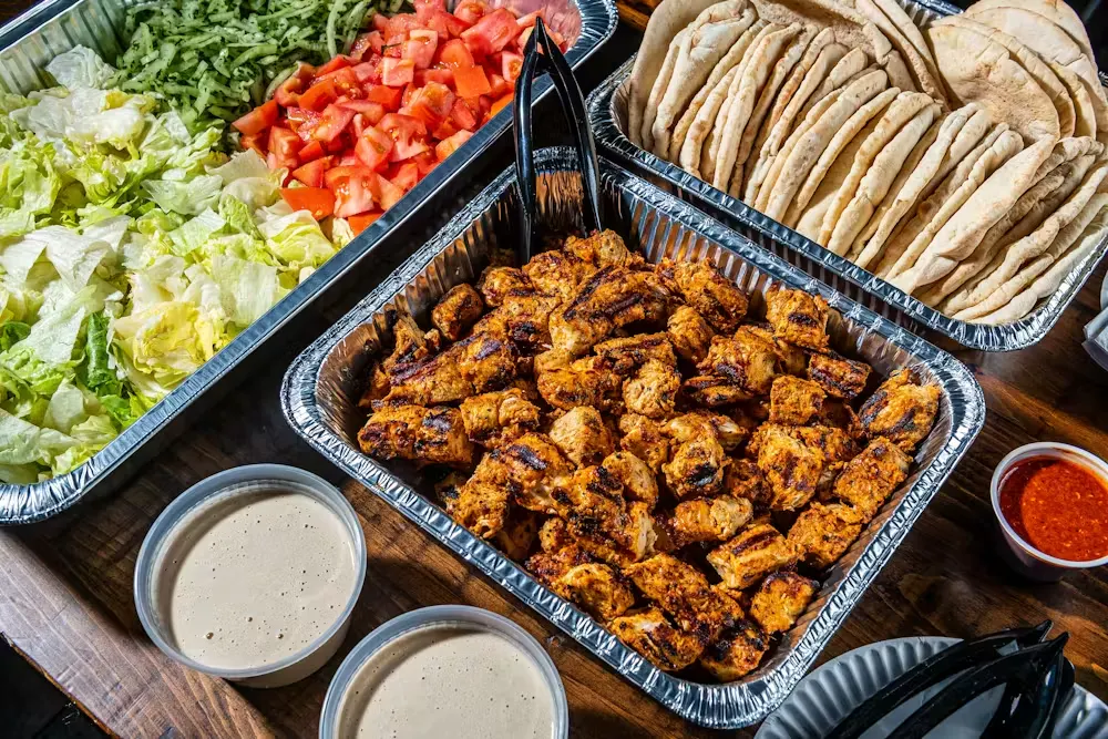 Hummus Tray and Mamoun's Salad Tray Catering Lifestyle Photo