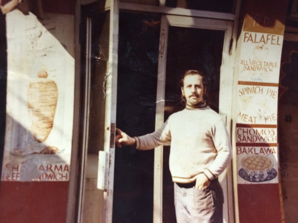 a man standing in front of a door