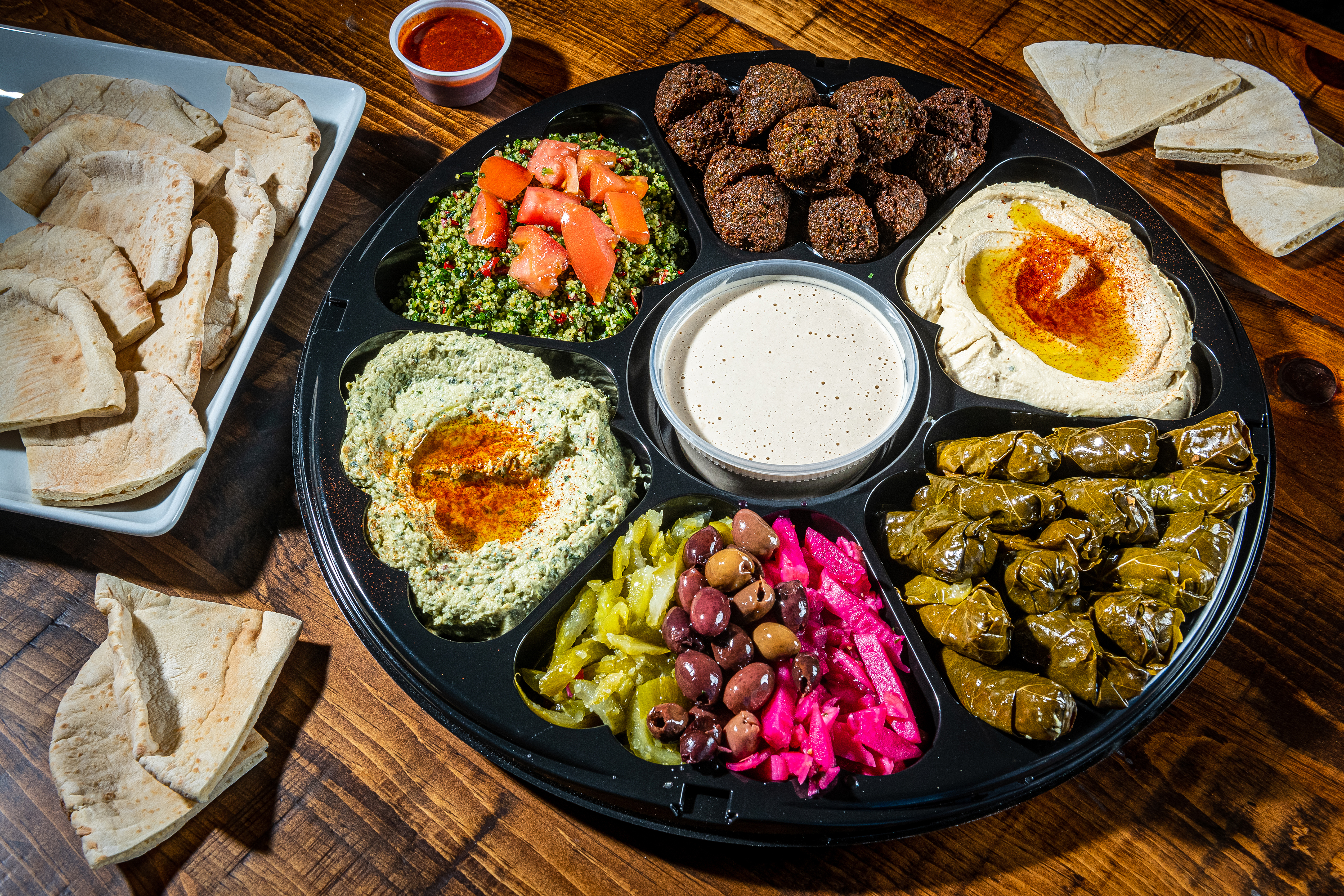 Mamoun's Vegetarian Platter with falafel, hummus, baba ganouj, tabbouleh and grape leaves, vegan and mostly gluten-free