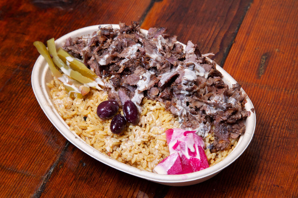 Meat Party Platter with Pita Bread and Hot Sauce Catering Lifestyle Photo