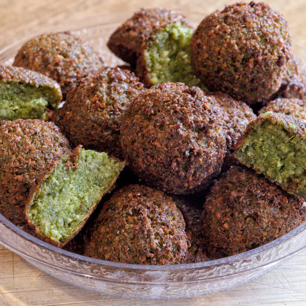 Falafel Balls with Green Center in Glass Bowl Lifestyle Photo