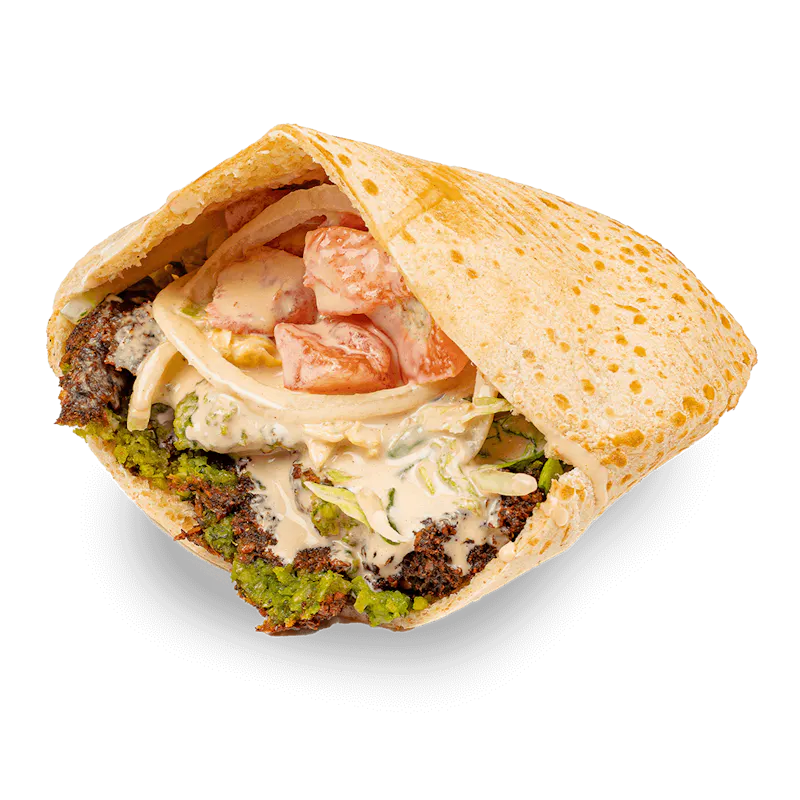 Mamoun's falafel sandwich in a pita with lettuce, tomatoes, onions and tahineh sauce