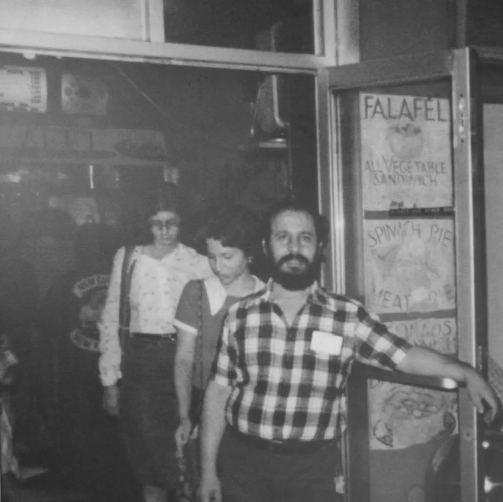 Historic black-and-white photo of the original Mamoun's Falafel storefront on MacDougal Street in Greenwich Village