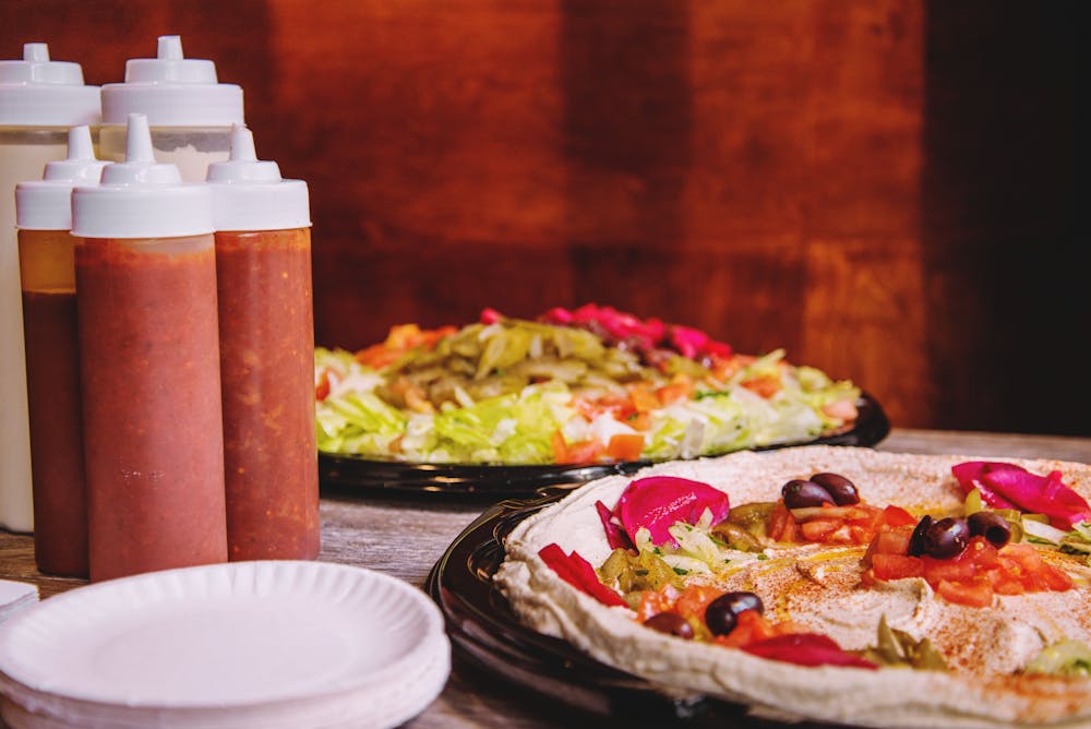 Hummus Tray and Mamoun's Salad Tray Catering Lifestyle Photo