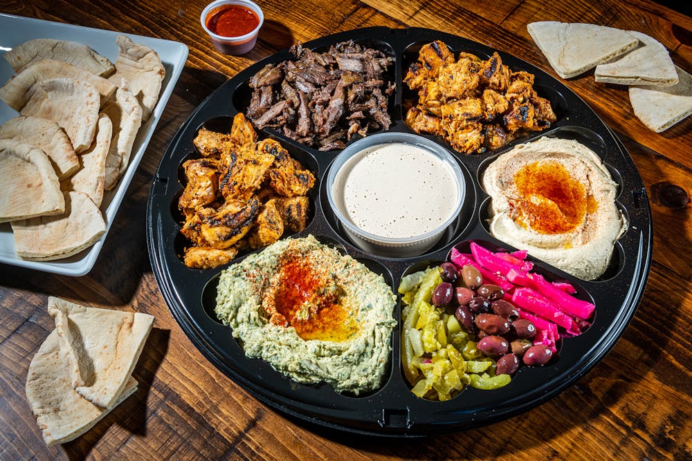 Meat Party Platter with Pita Bread and Hot Sauce Catering Lifestyle Photo