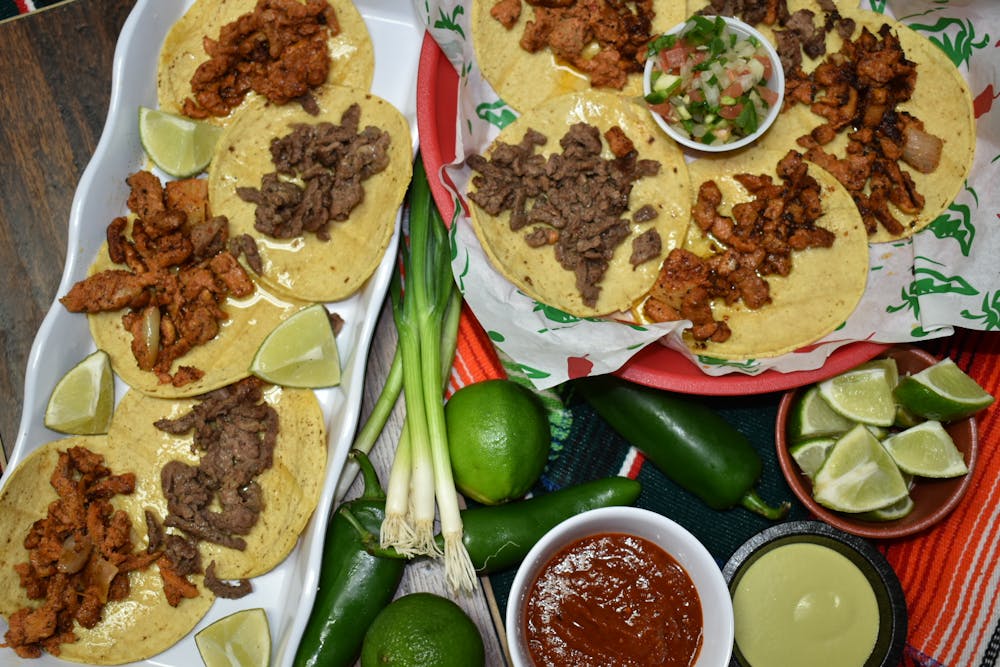 a box filled with different types of food on a plate