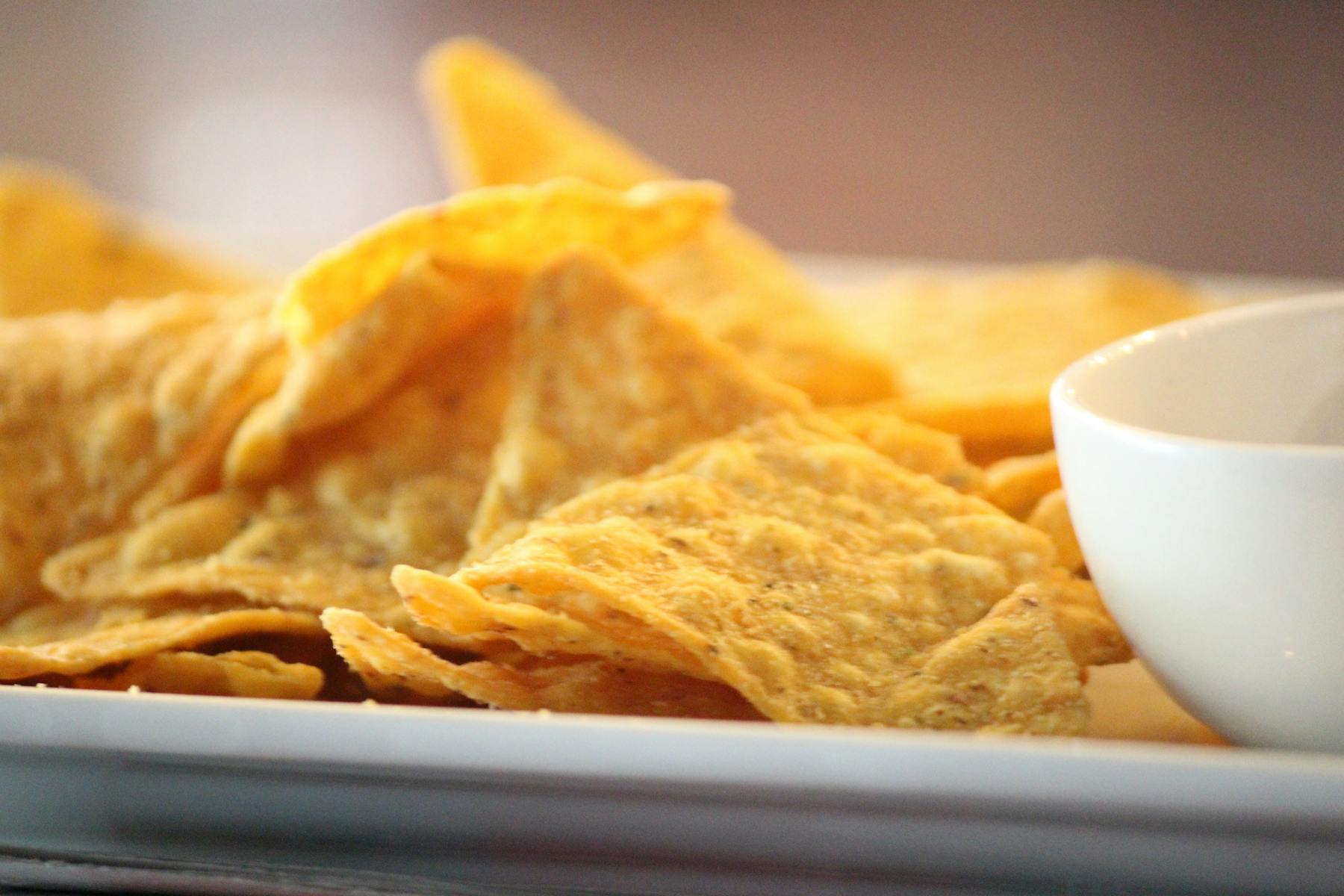 a close up of nacho chips