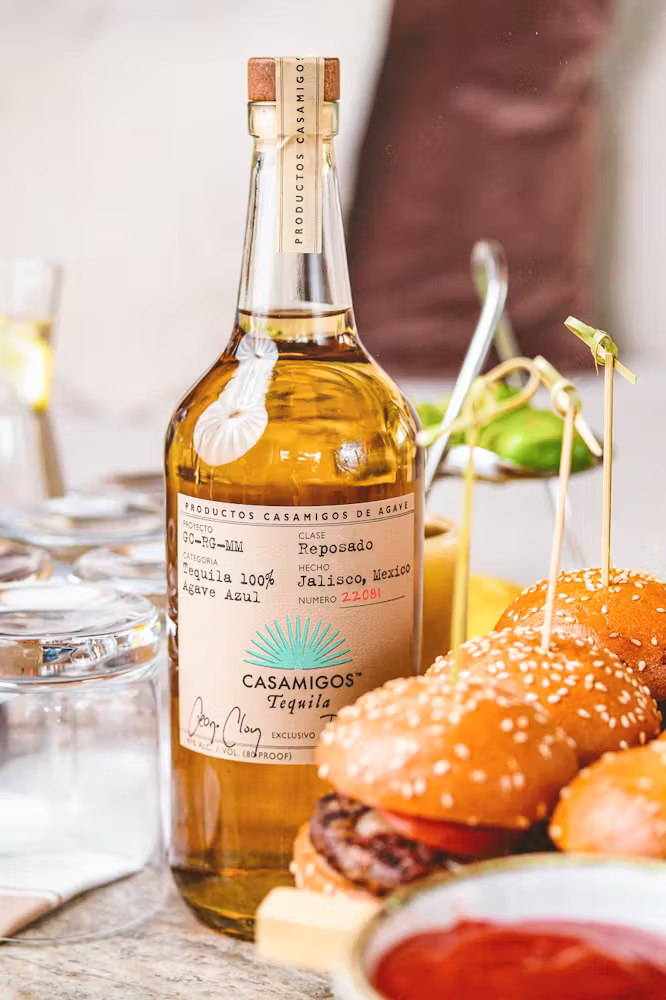 a photo of a Casamigos Reposado bottle of tequila inside Bel-Aire Lounge