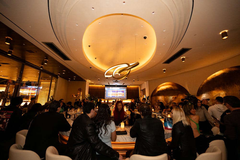 a crowd of people inside a Las Vegas lounge called Bel-Aire