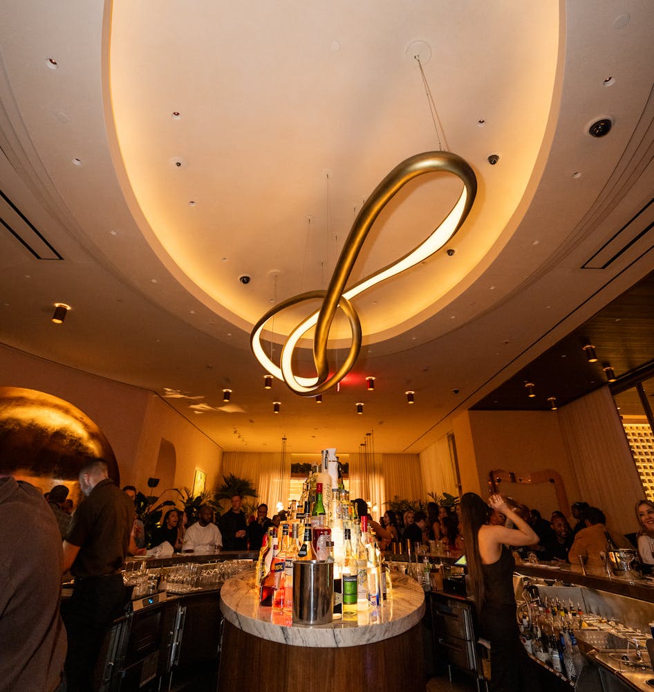 a photo of the bar and chandelier at Bel-Aire a Las Vegas lounge