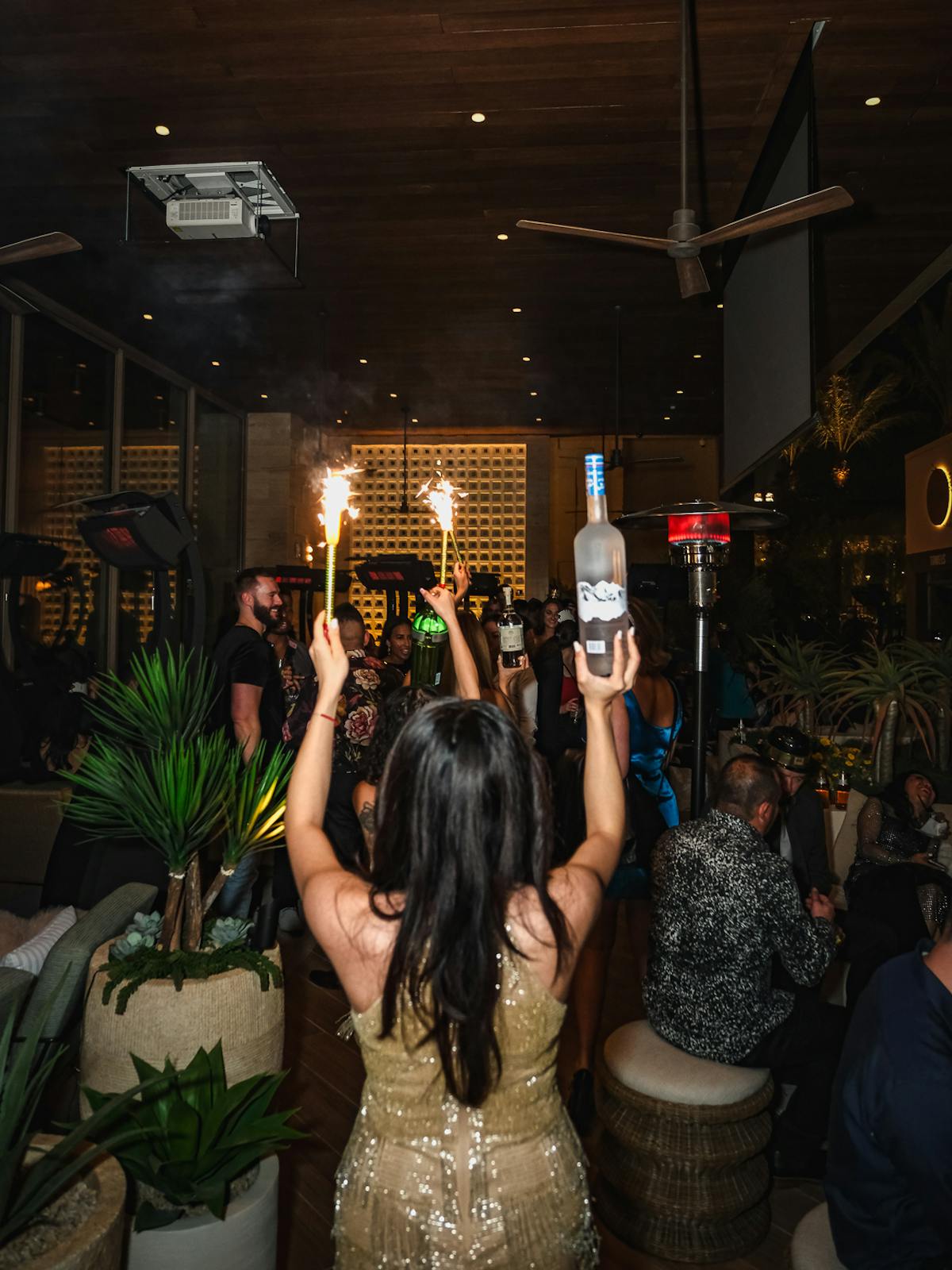 A bottle of Belvedere coming out at Bel-Aire Lounge Las Vegas for a birthday