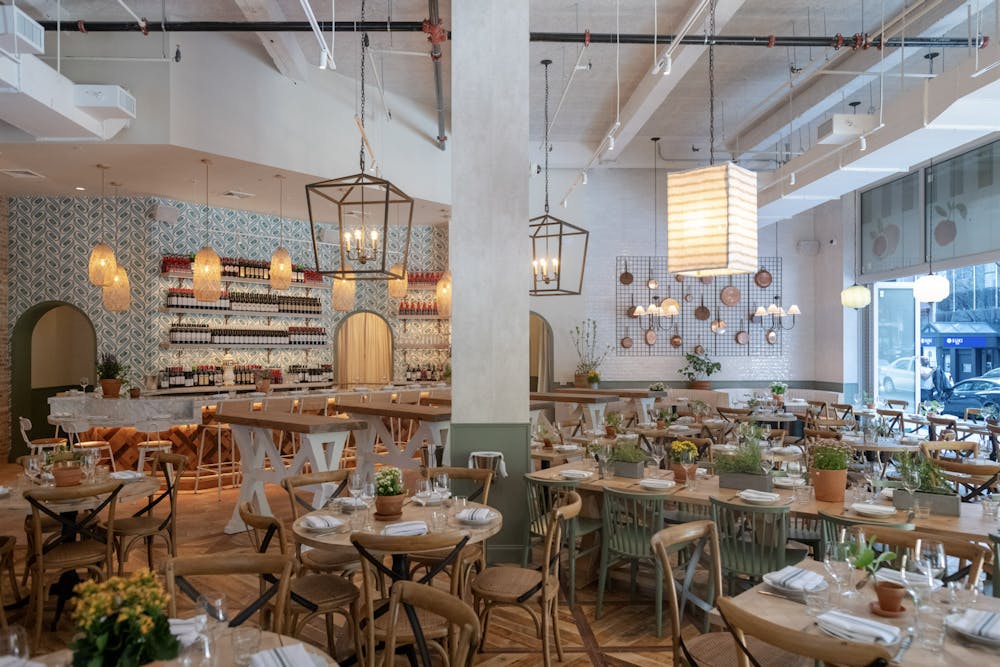a dining room table in front of a building
