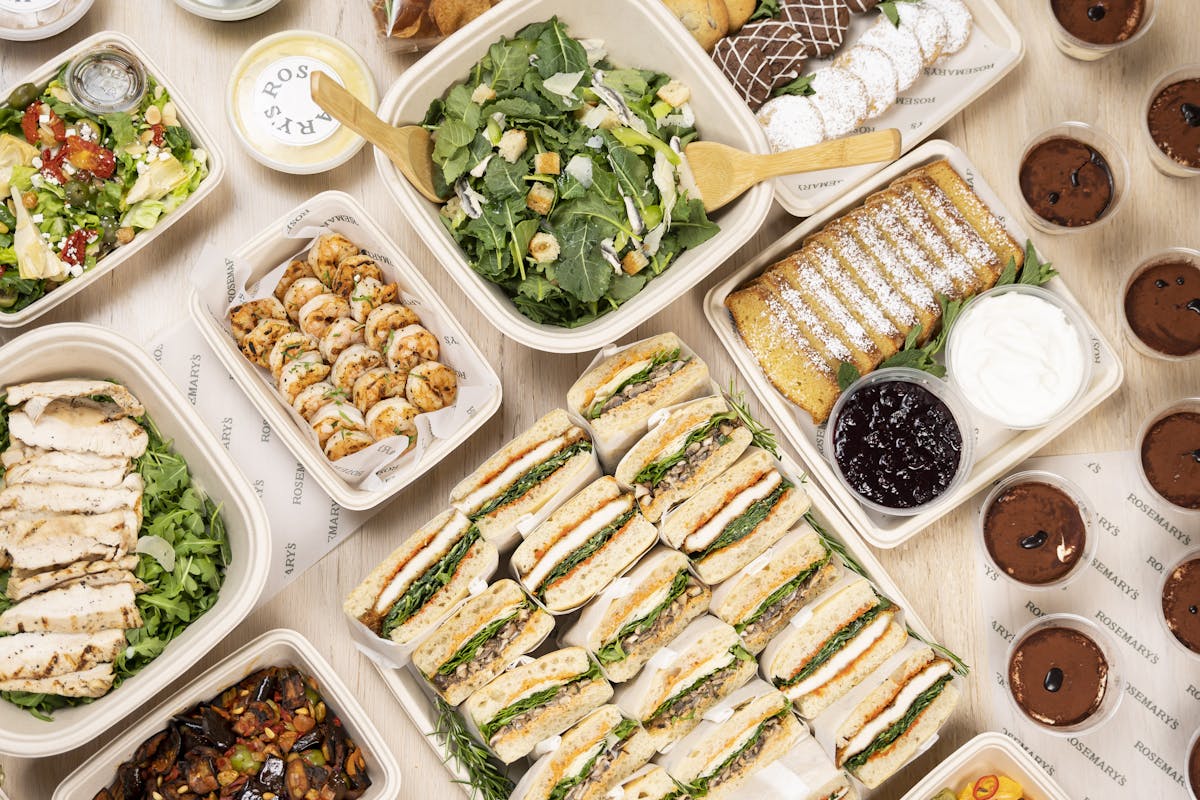 a bunch of different types of food on a table